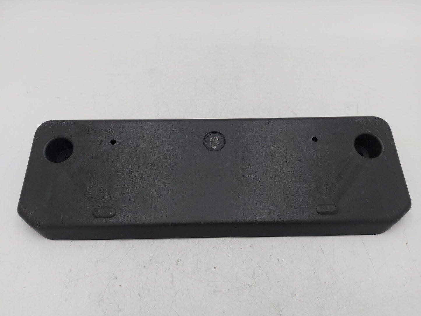 21 TOYOTA 4RUNNER FRONT License Plate Bracket PZ321-35700 *Gouged*