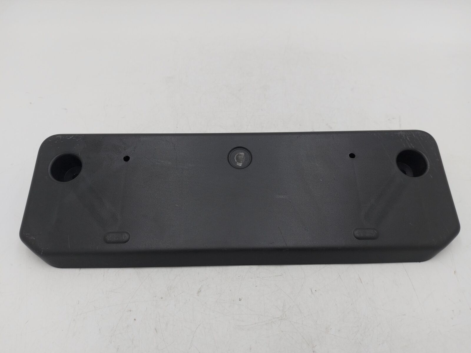 21 TOYOTA 4RUNNER FRONT License Plate Bracket PZ321-35700 *Gouged*