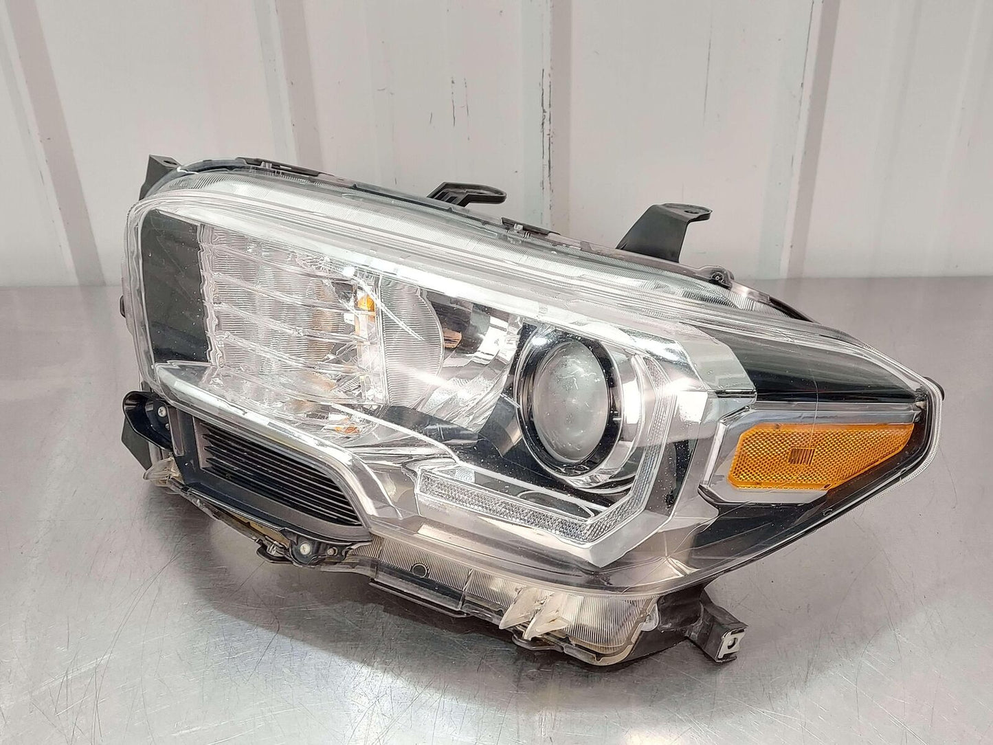 16-23 TOYOTA TACOMA FRONT LEFT HEADLIGHT HEADLAMP HALOGEN W/ CHROME TRIM OEM