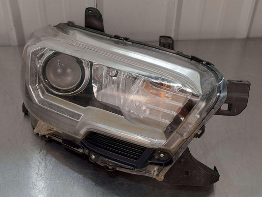 16-23 TOYOTA TACOMA FRONT RIGHT HEADLIGHT HEADLAMP HALOGEN W/ CHROME TRIM OEM