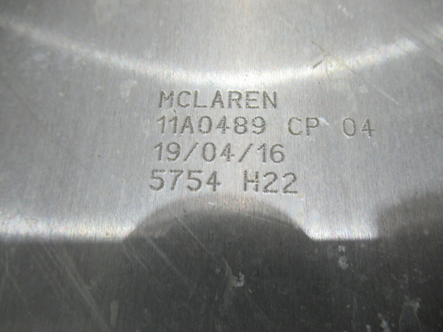 T020 2016 16 MCLAREN 570S CENTER SKID PLATES DENTED 11A0489CP