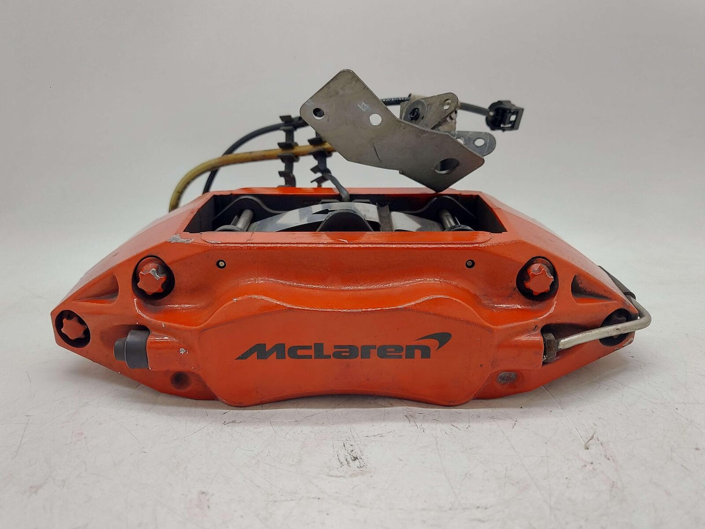 2016 MCLAREN 540C FRONT LEFT BRAKE CALIPER RED 11C0735CP *CHIPS*