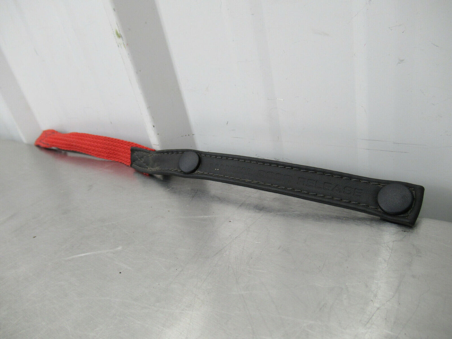 T020 2016 16 MCLAREN 570S LH LEFT EMERGENCY DOOR RELEASE STRAP