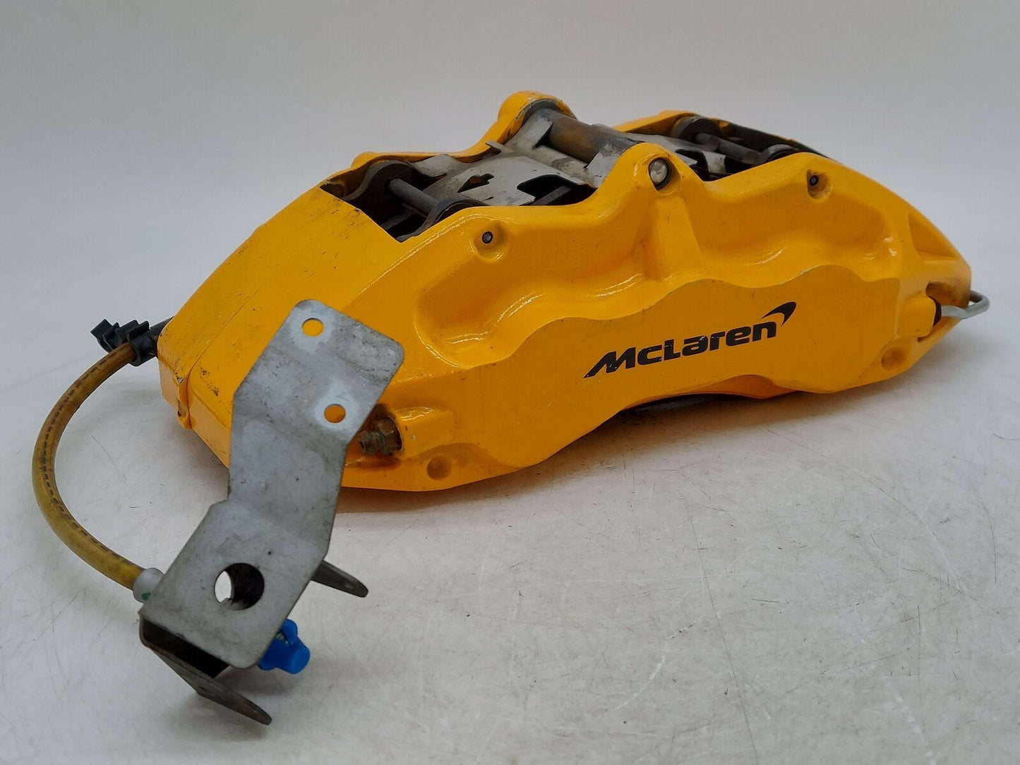 2017 MCLAREN 570S FRONT LEFT BRAKE CALIPER ORANGE 11C0063CP *GOUGED PAINT*